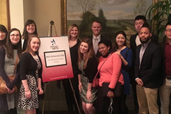 Ohio State graduate students with Arts Advocacy Day sign