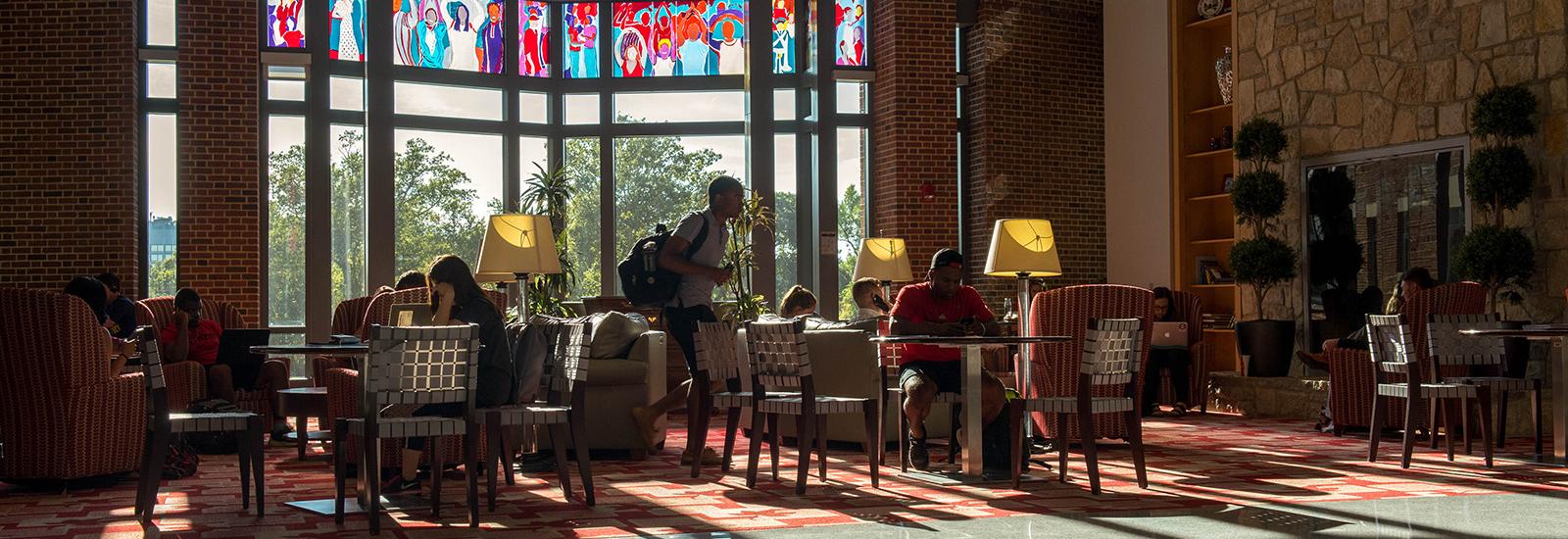 Students studying in dim light at the Ohio Union