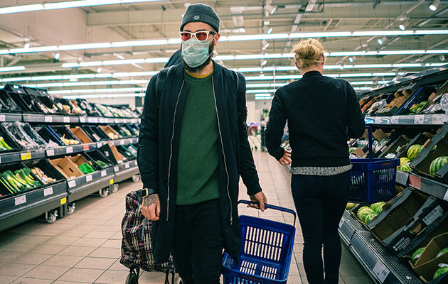 Man wearing mask in supermarket