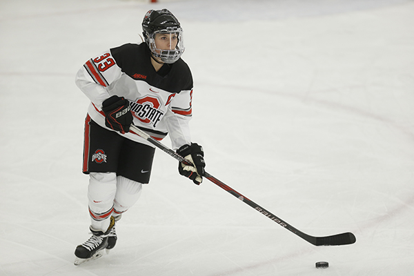 Jincy Dunne playing hockey for Ohio State