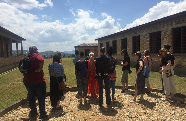 Students in Ohio State’s “Genocide and its Aftermath in Rwanda” study abroad program stand at the Murambi Genocide Memorial Center, which sits atop the buried remains of more than 50,000 victims of the 1994 Rwandan genocide. 