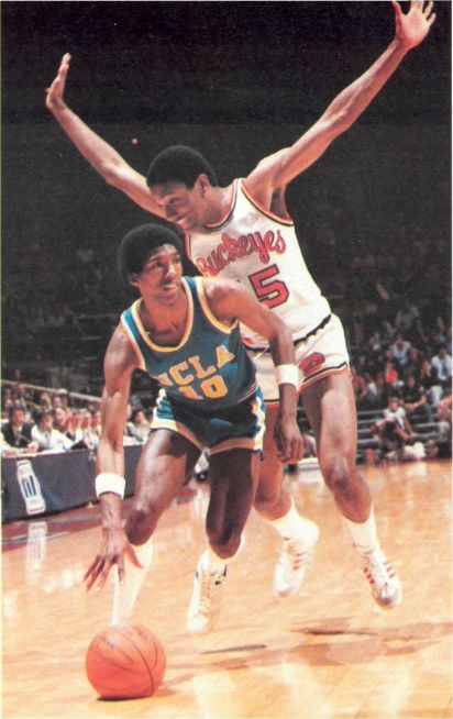Miller defends in an Ohio State basketball game.