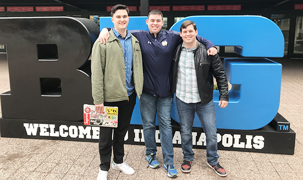 From left: Former Sports Editor Griffin Strom, Sports Director Brian Nelson and Assistant Sports Editor Andy Anders in front of the Bankers Life Fieldhouse in Indianapolis shortly after it was announced that the Big Ten Conference men's basketball tournam