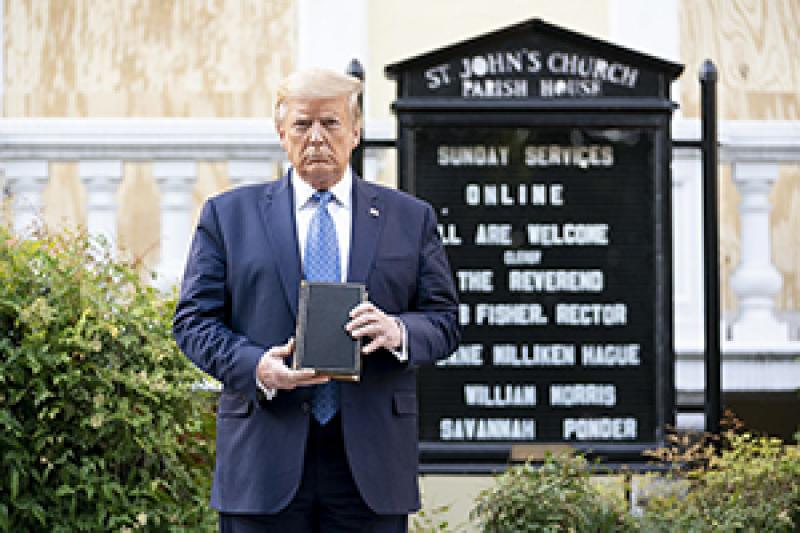 President Donald Trump holds a copy of the Bible in front of St. John's Episcopal Church just north of Lafayette Square.