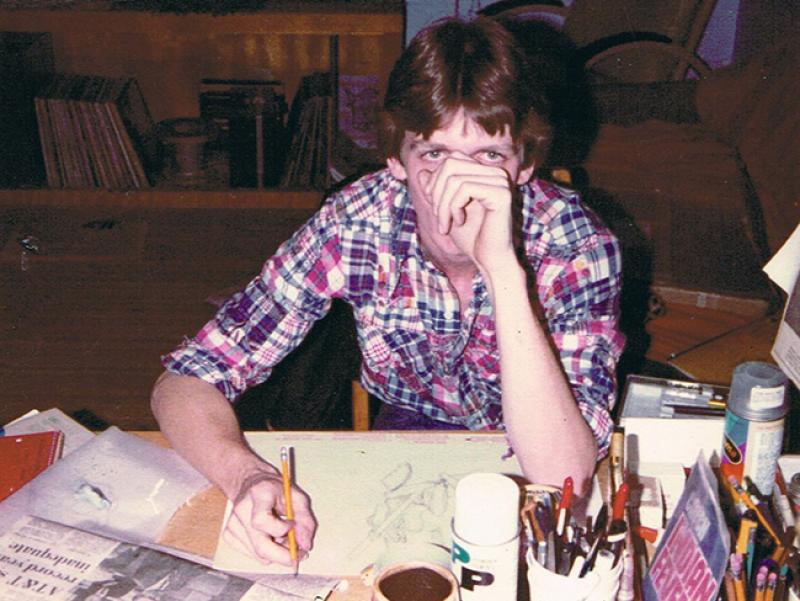 John "Derf" Backderf drawing Lantern cartoons in his dorm room in Siebert Hall in 1982.