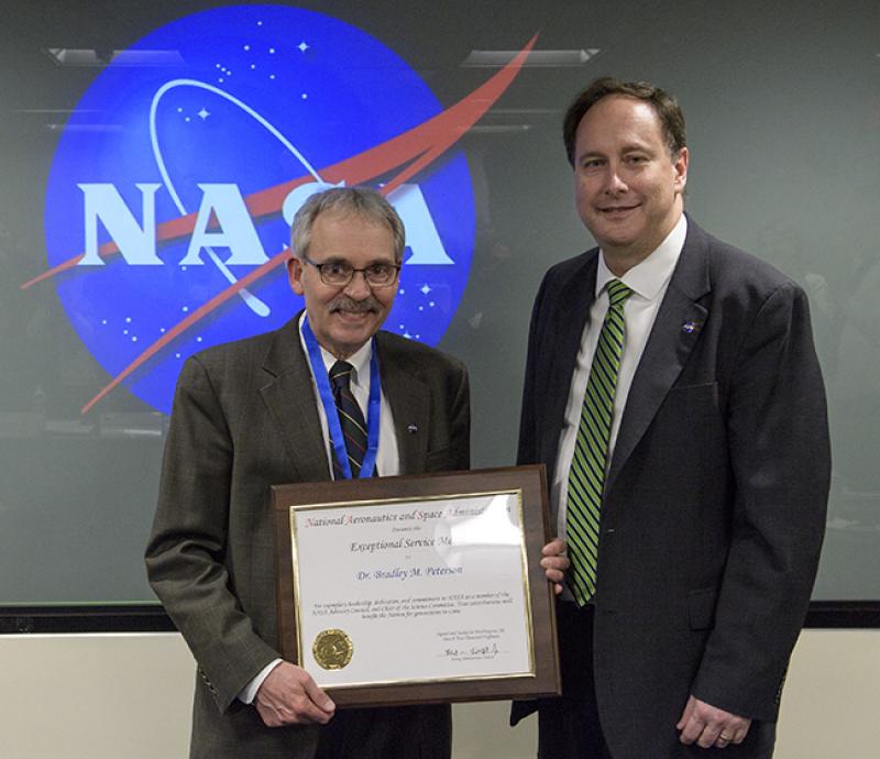 Bradley Peterson, left, and Robert Lightfoot, acting administrator of NASA.