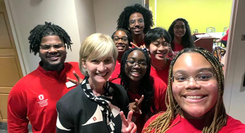 PASS students pose with Ohio State President Kristina M. Johnson