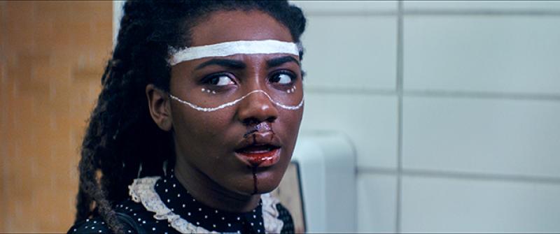 Charlotte, played by Ireon Roach, after football players cause her to trip in the hallway.