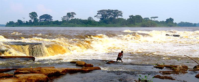 Fisherman at the Boyoma falls on the Congo River. Photo courtesy CRREBaC/CRuHM