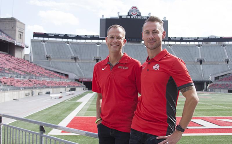 Rob Gast (right) stands with his fiance, Matt Hall, at Ohio Stadium.