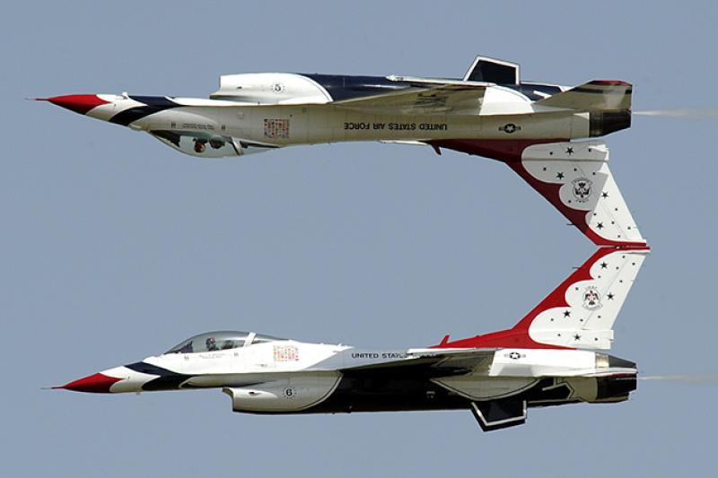 Thunderbirds No. 5 and 6 perform the calypso maneuver. Photo credit U.S. Air Force.
