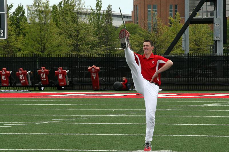 photo of Konner Barr performing toe-touch salute during 2017 drum major tryouts