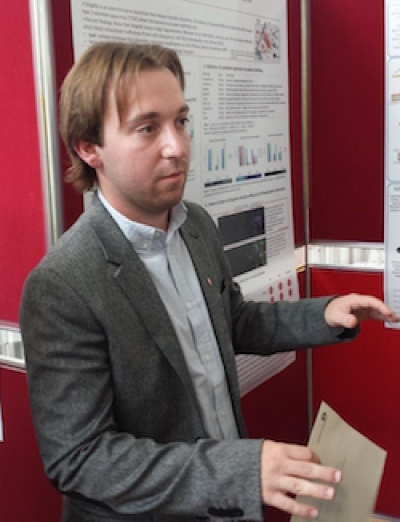 Adam Bercz presents his poster