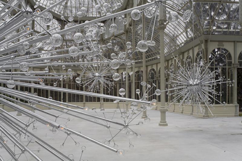 "Island Universe" created by Josiah McElheny hangs at the the Palacio de Cristal of the Museo Reina Sofia in Madrid.