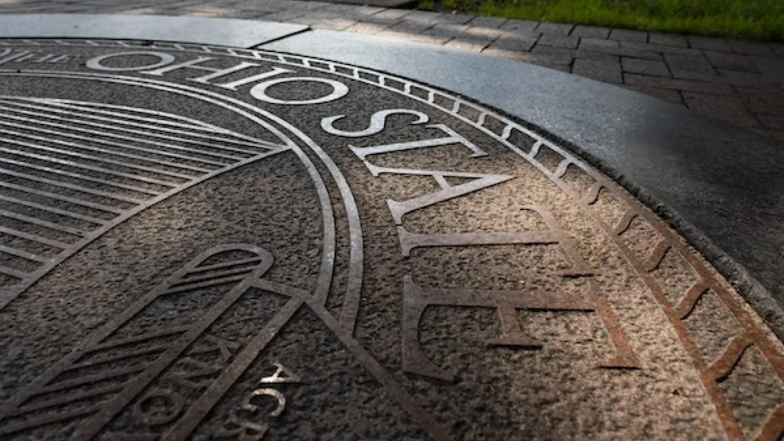Outdoor architecture, design and branding details of The University Seal on The Oval.