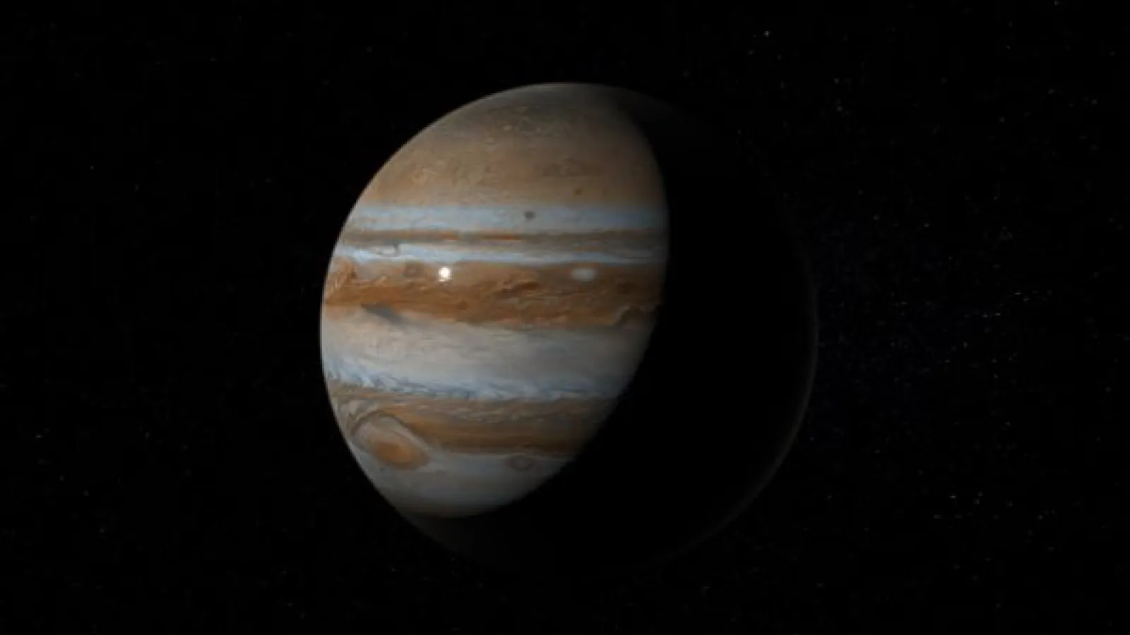 a dark shot of the planet Jupiter