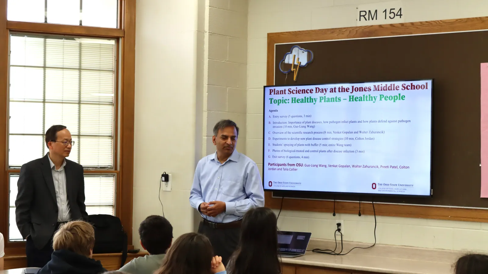 Gopalan and Wang teaching at a middle school