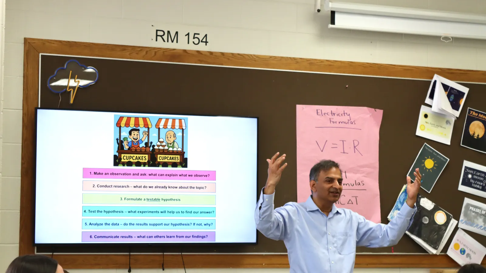 Venkat Gopalan enthusiastically teaching students about the scientific method