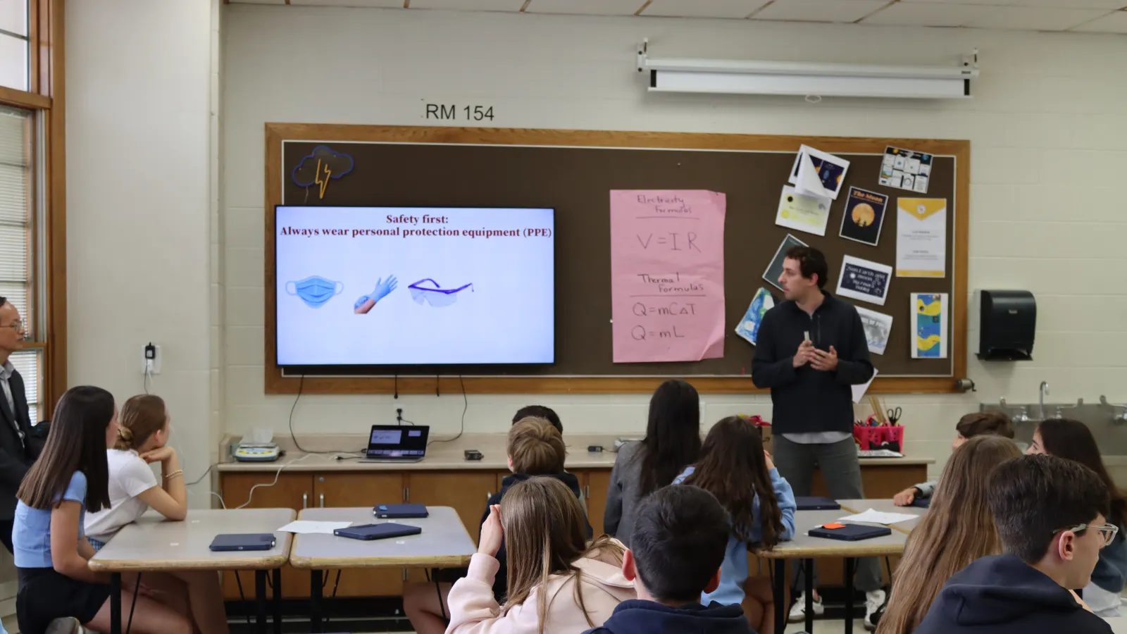 Jordan introduces students to common personal protective equipment in the lab