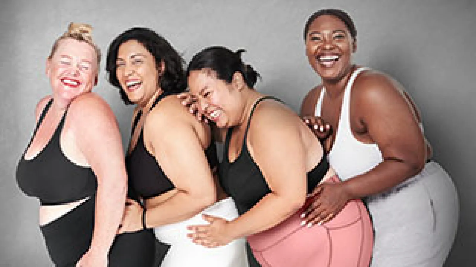 Four overweight female models of varying skin tones