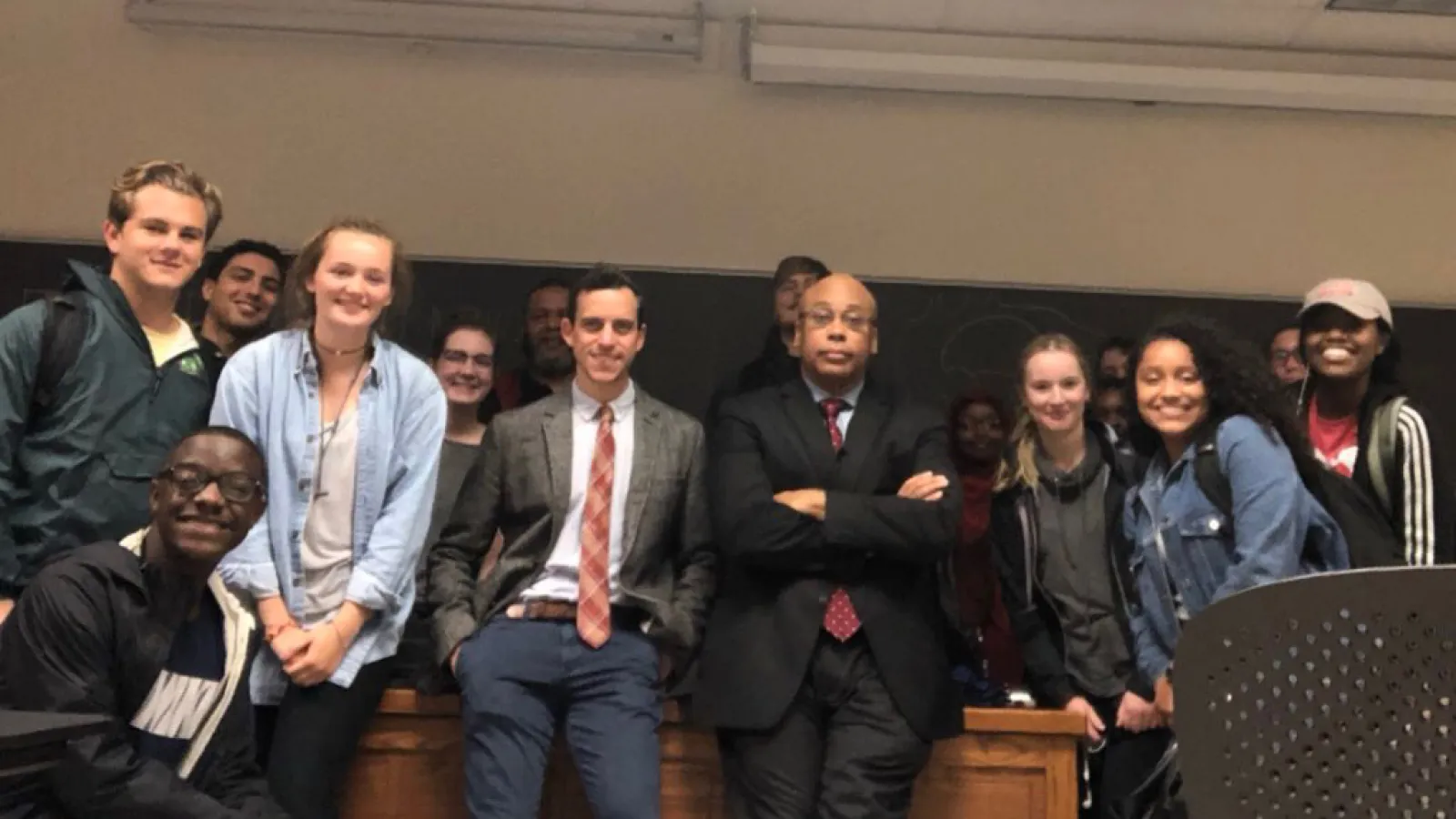 Eric Herschthal (center left) and Dr. Quinn Capers (center right) pose with students from the class they co-teach, AFAMAST 4326: Race and Medicine.