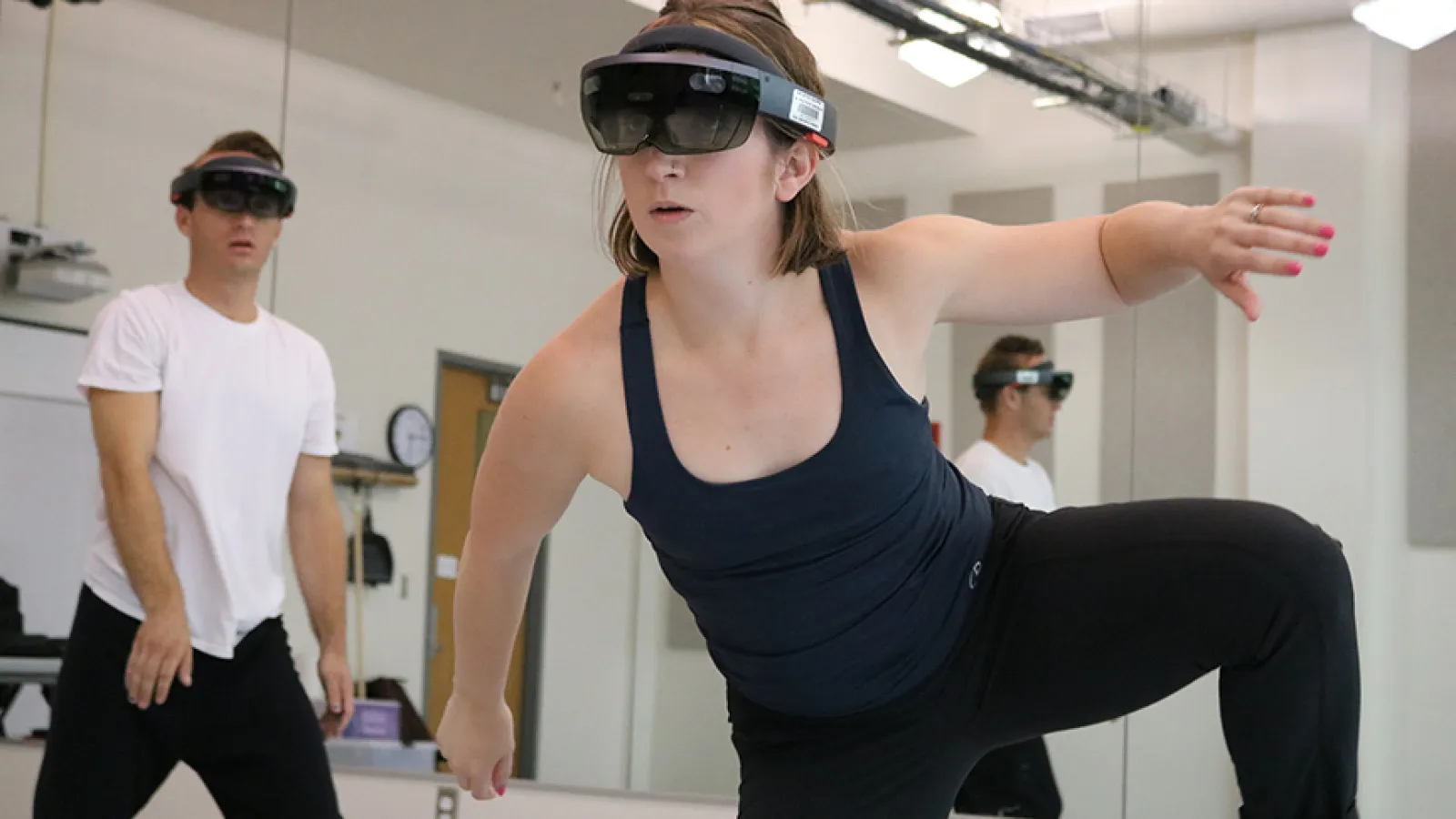 Josh Anderson and Michelle Sipes, graduates students in the Department of Dance, dance using the LabanLens software, which is an app downloaded to the Microsoft HoloLens device.
