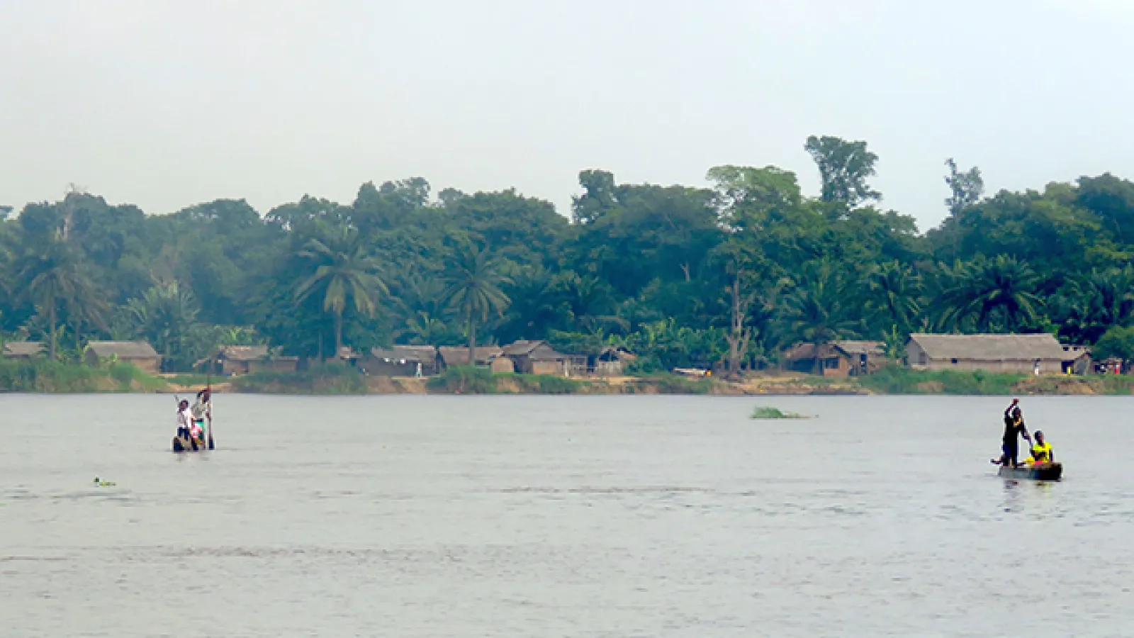 Two boats on the Congo River. Photo courtesy CRREBaC/CRuHM