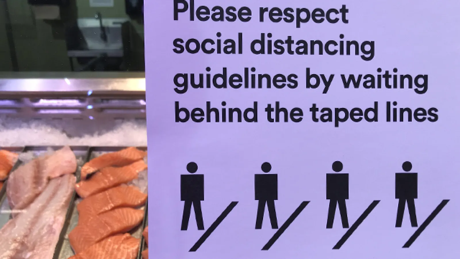 Social distancing sign in grocery store