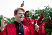 Members of the Men’s Glee Club perform the Ohio State fight song at Browning Amphitheatre.