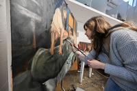 Ohio State student artist Kasmira Snyder painting