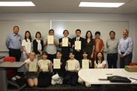A group photo with students and faculty from Ohio State, the University of Osaka and employees from OTC Daihen