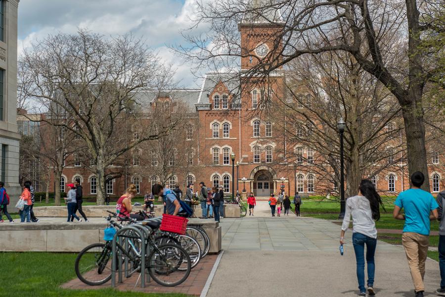 Students walking around campus during an overcast day