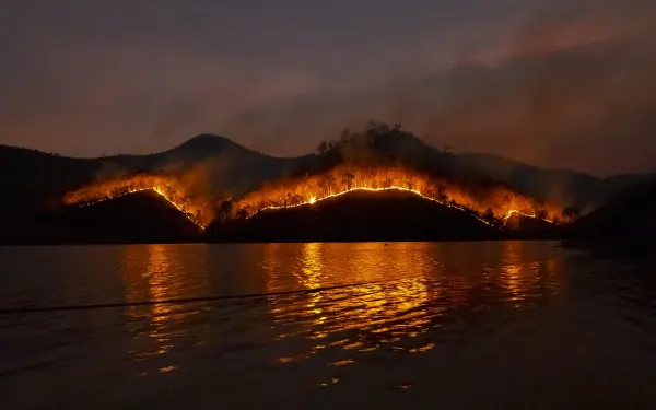 Wildfire over hills