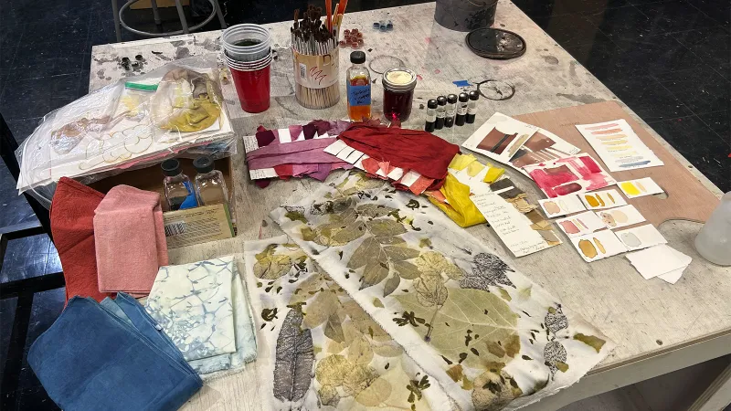 Table with covered with natural pigment materials