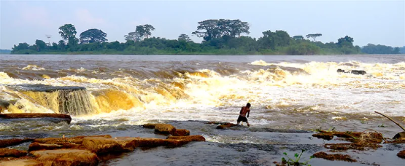 Fisherman at the Boyoma falls on the Congo River. Photo courtesy CRREBaC/CRuHM