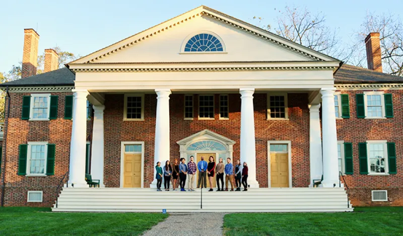 Associate history professor Hasan Jeffries and his students stand outside of James Madison's Montpelier. 