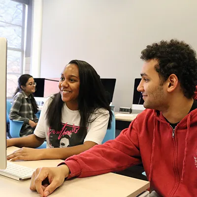 Students working together at a computer