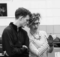 Sarah Neville talking with student