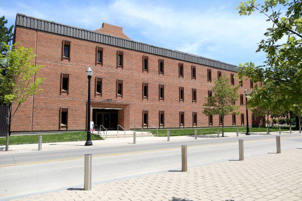 Dulles Hall, a brick building with narrow windows