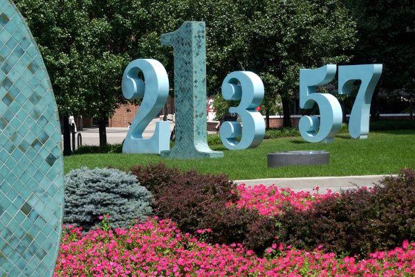 Garden of Constants, teal blue sculptures of numbers