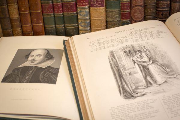 old books showing a Shakespeare portrait and a page from Romeo and Juliet