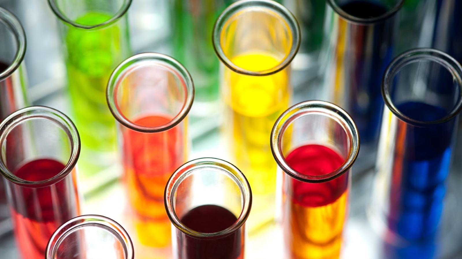 test tubes containing colorful liquids