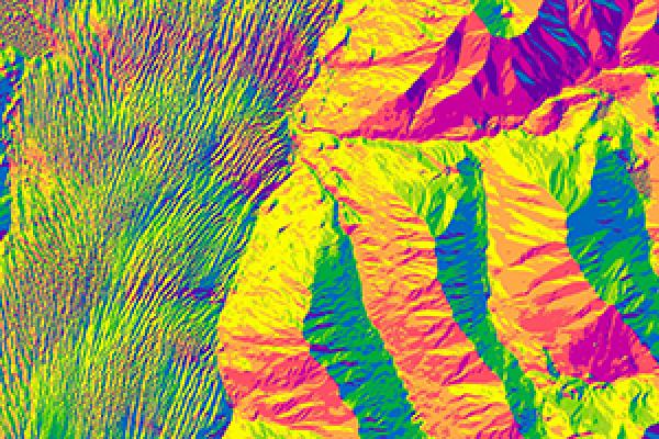 An ArcticDEM “aspect” map, color-coded by the orientation of downward sloping terrain. 