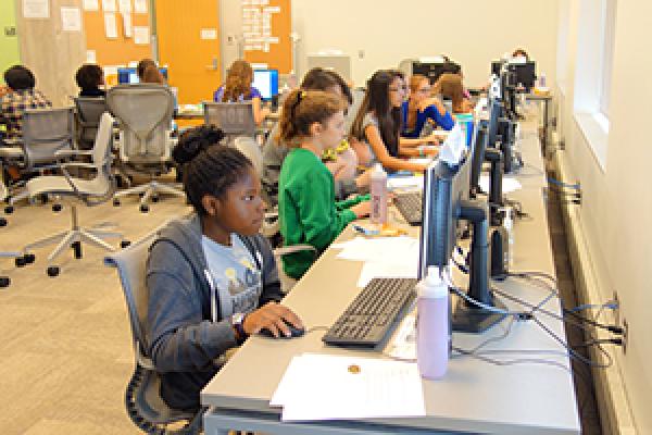 Students at computers learning how to animate