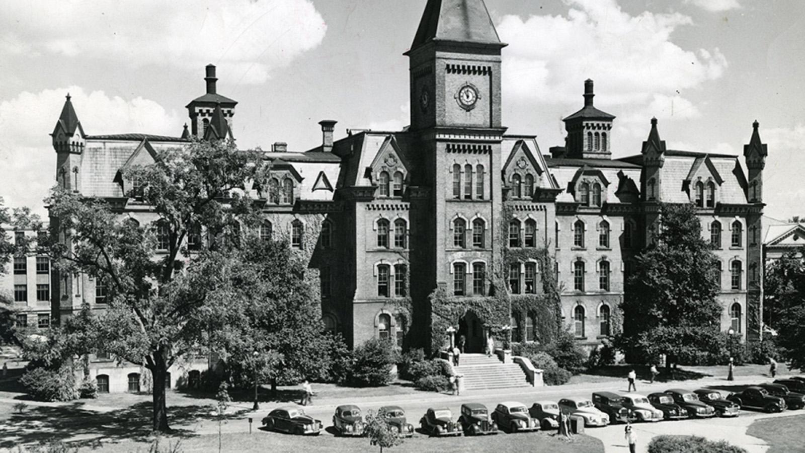 University Hall with 1940s cars parked in the front