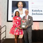 Katelyn Jackson Nnake accepting her Emerging Leader Award from Dean Horn